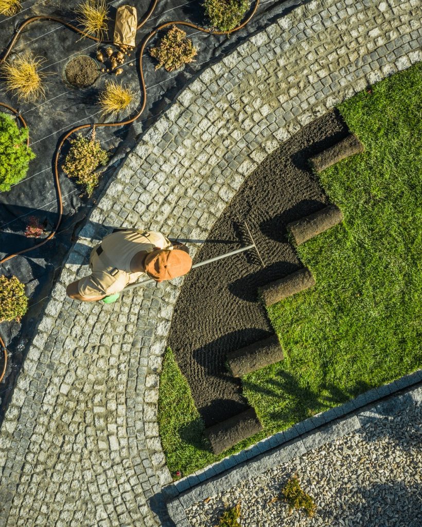 gardener-in-newly-build-backyard-garden.jpg